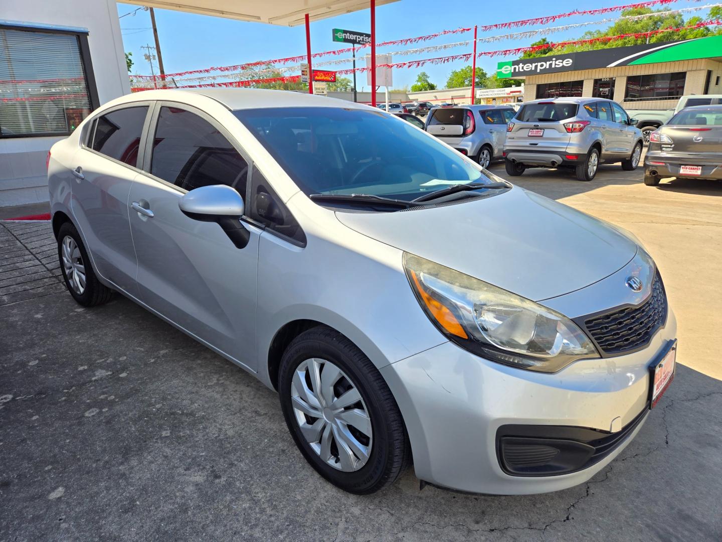 2014 Kia Rio (KNADM4A30E6) with an 1.6L I4 F DOHC 16V engine, Manual Transmission transmission, located at 503 West Court, Seguin, TX, 78155, (830) 379-3373, 29.568621, -97.969803 - Photo#1